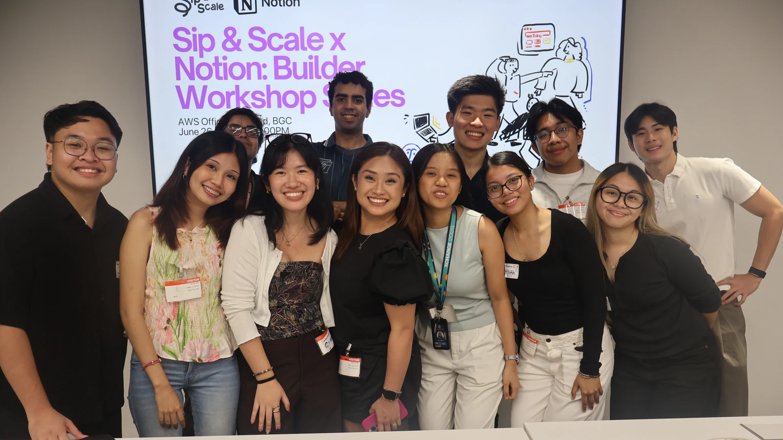 The Sip and Scale team in front of the workshop screen.